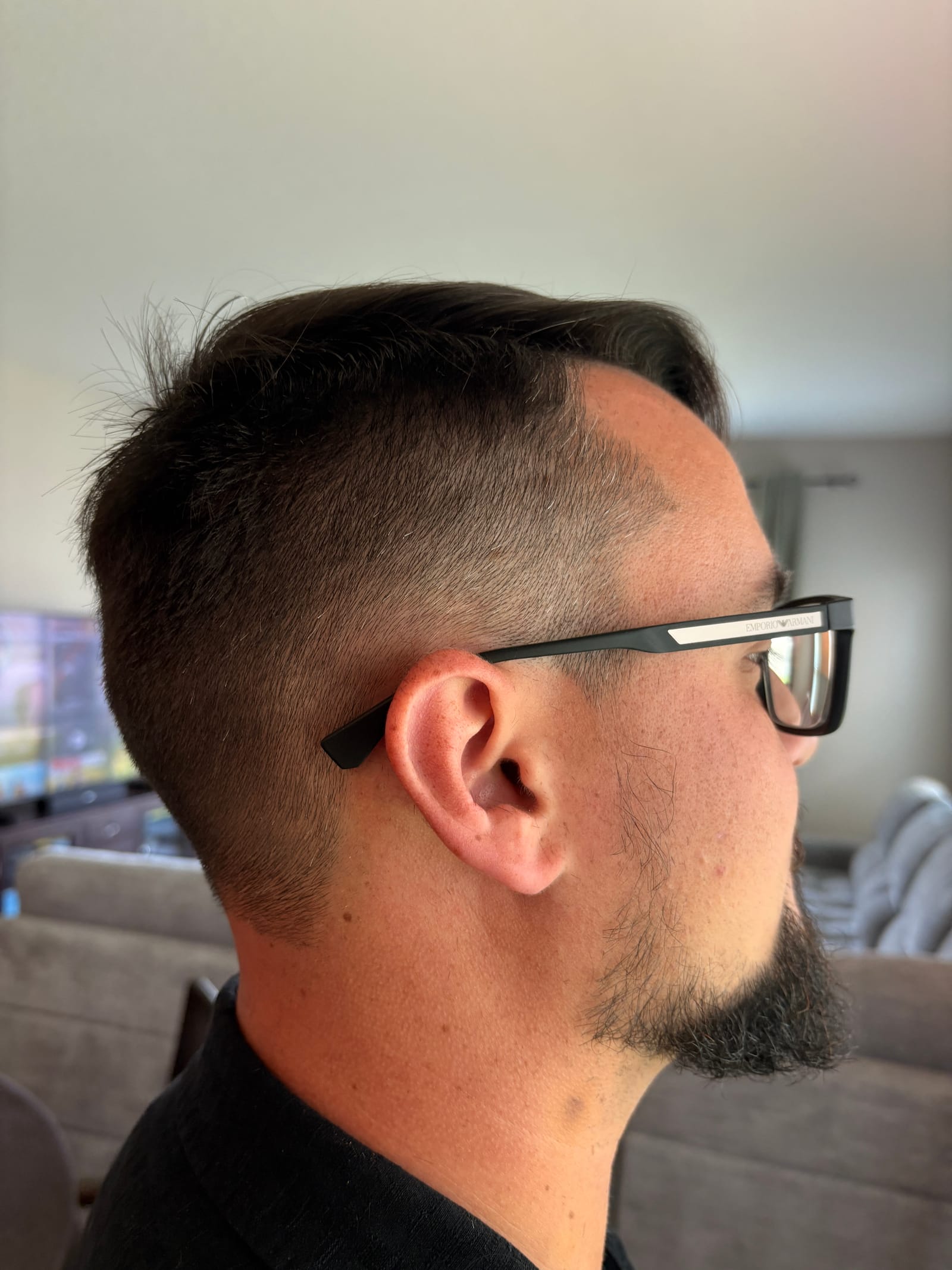 Clean skin fade — tight taper with textured top
